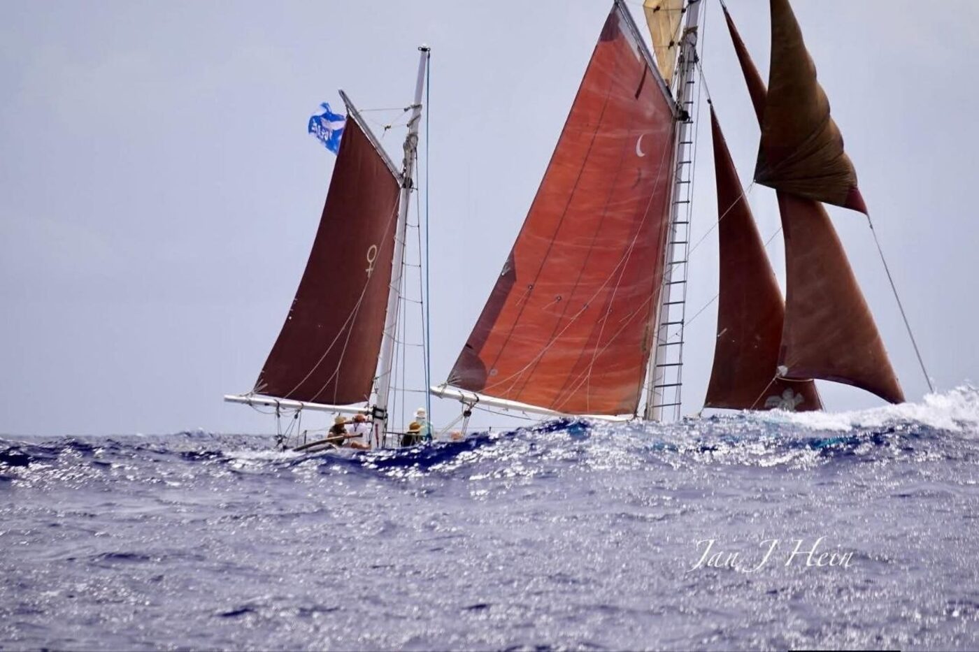 Cherub racing under tan sails with Venus mark