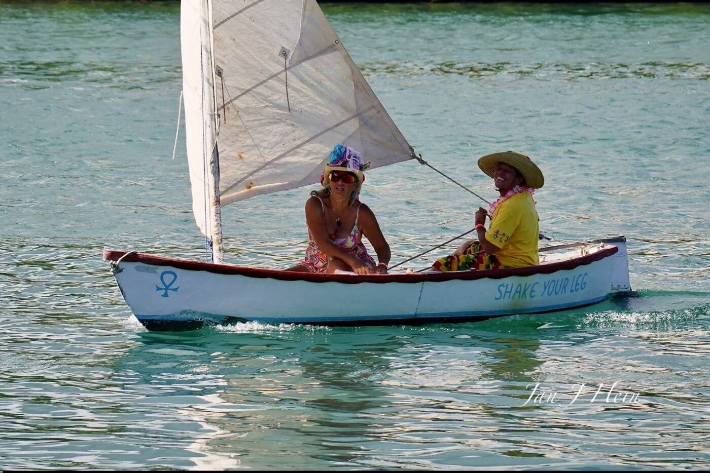 Angie and crew sailing a small dinghy